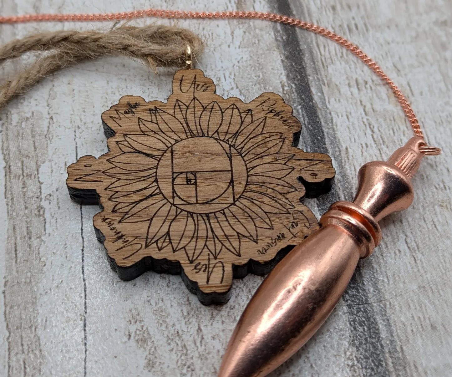 Tiny travel sized sunflower pendulum board, laser printed.