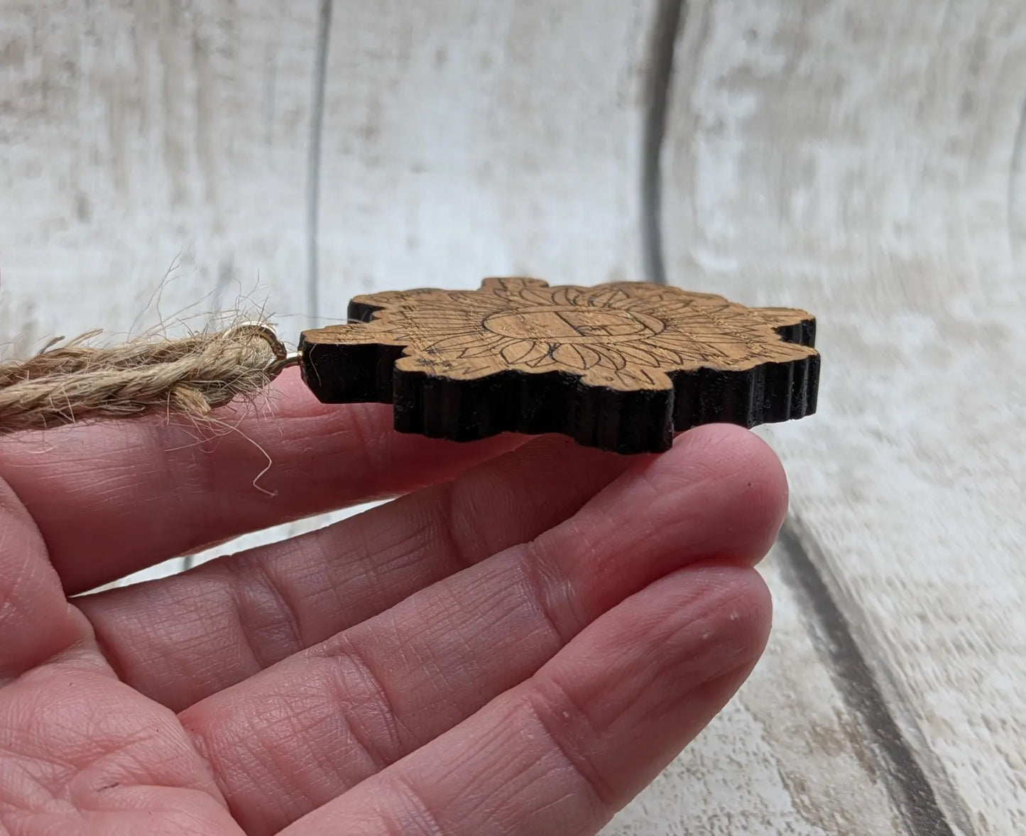 Tiny travel sized sunflower pendulum board, laser printed.