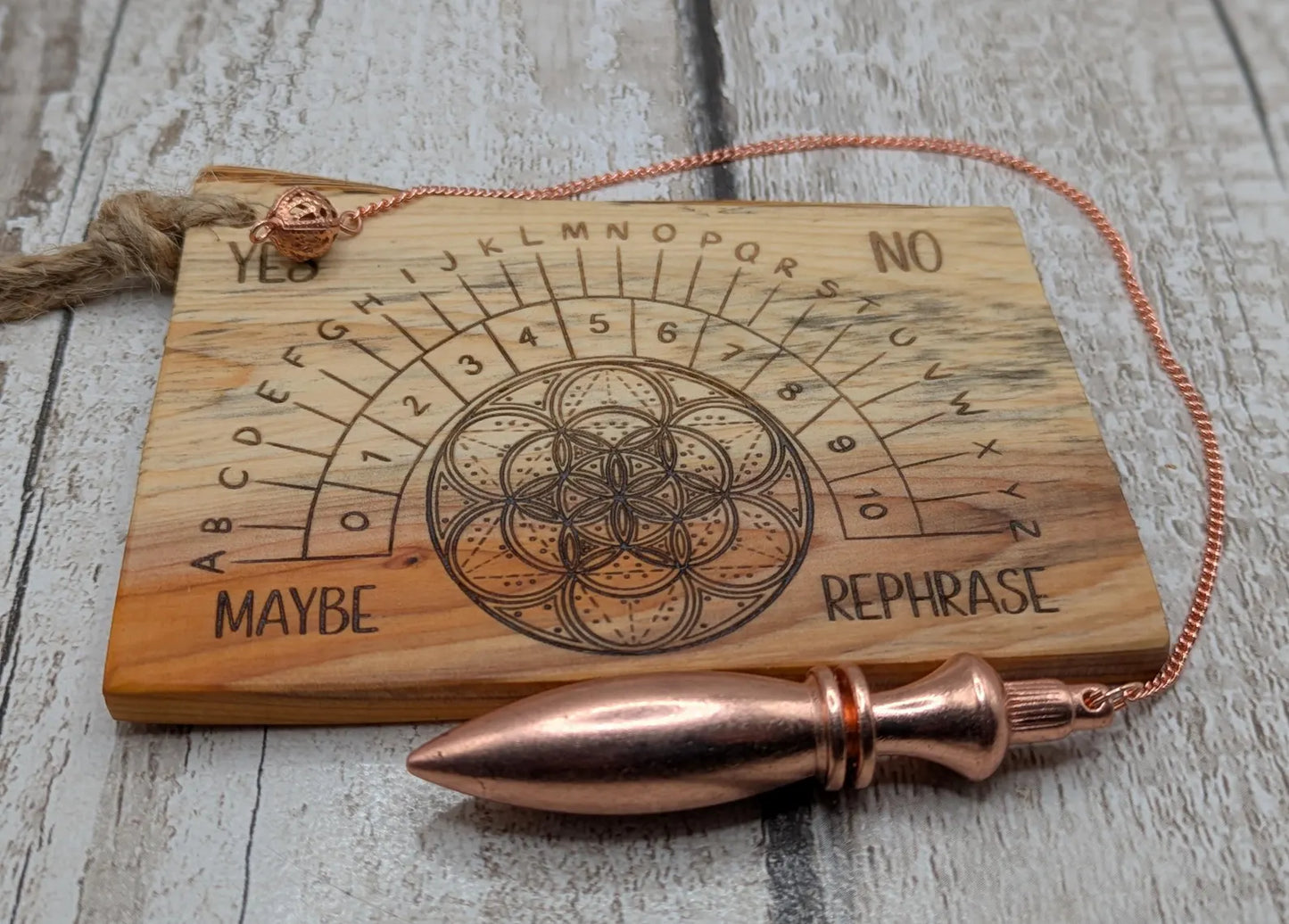 Yew wood travel sized yew wood pendulum board.