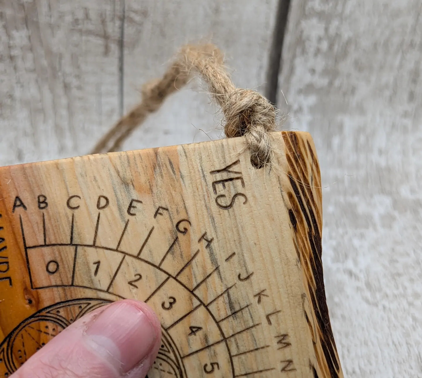 Yew wood travel sized yew wood pendulum board.