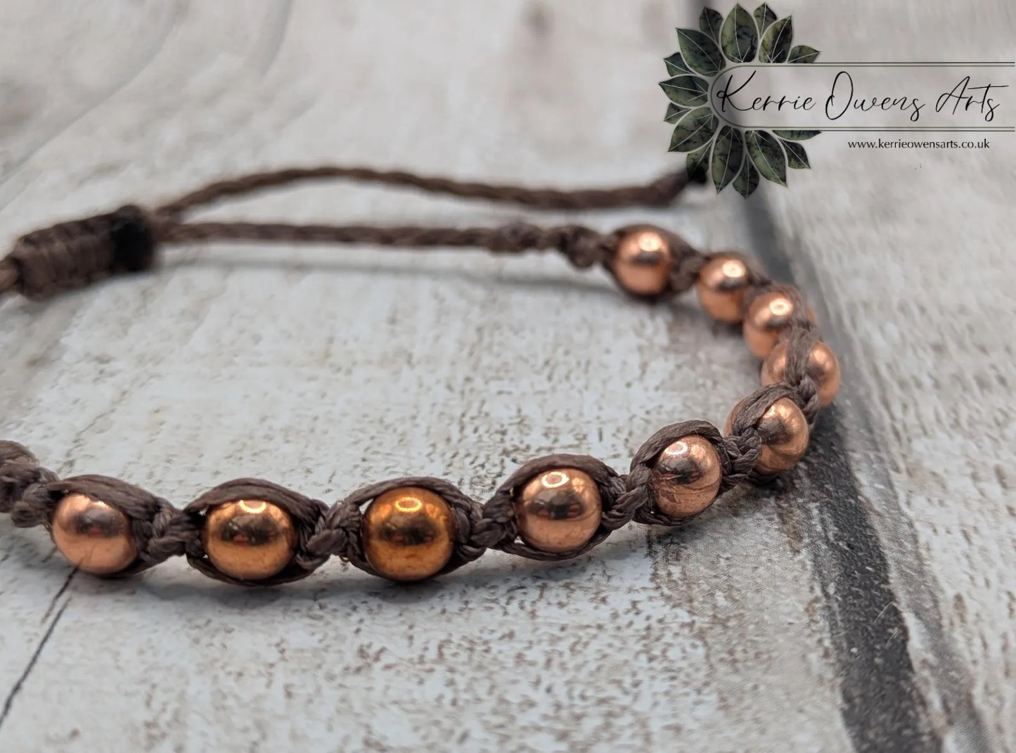 Copper beaded macramé woven adjustable bracelet.