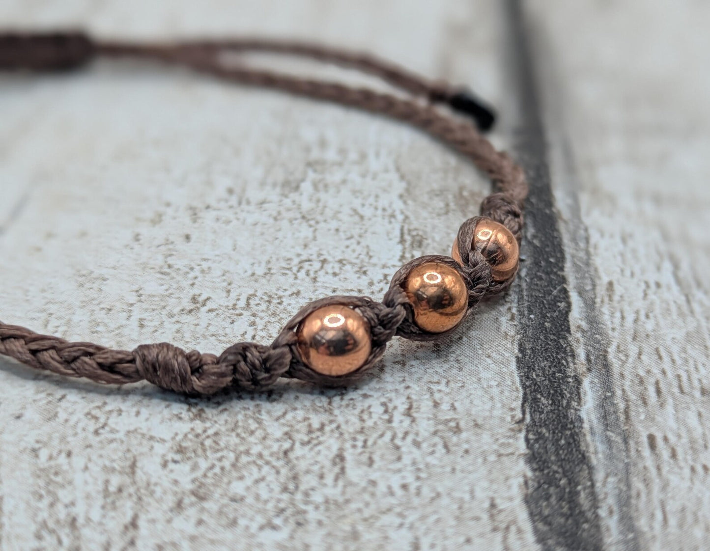 Copper macramé beaded adjustable bracelet.