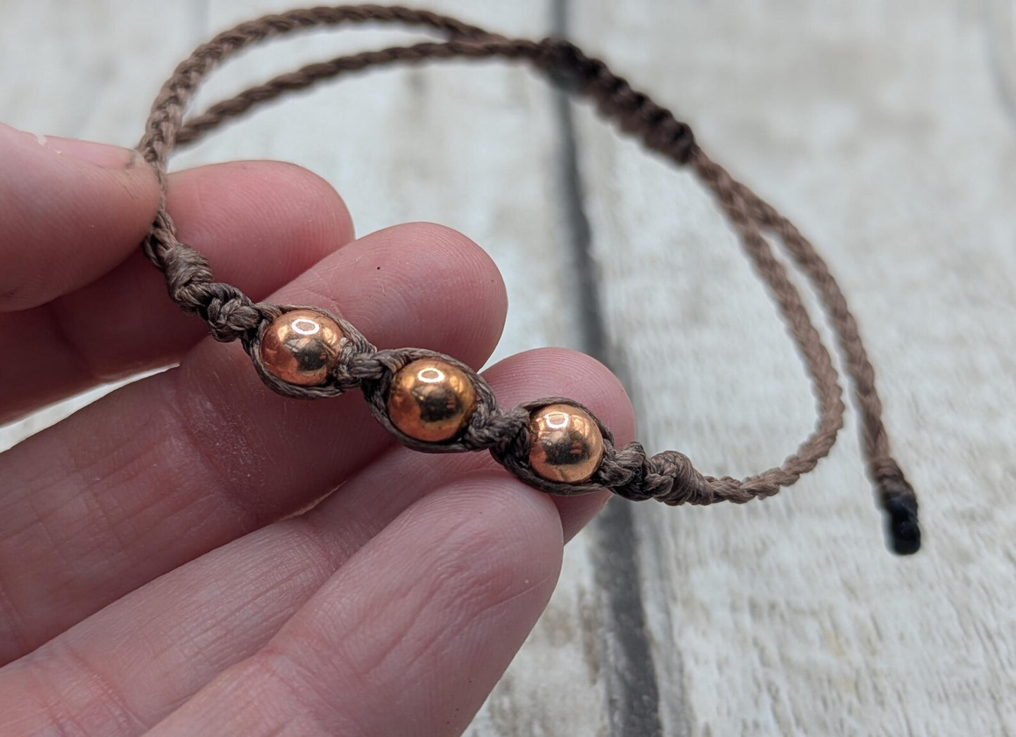 Copper macramé beaded adjustable bracelet.