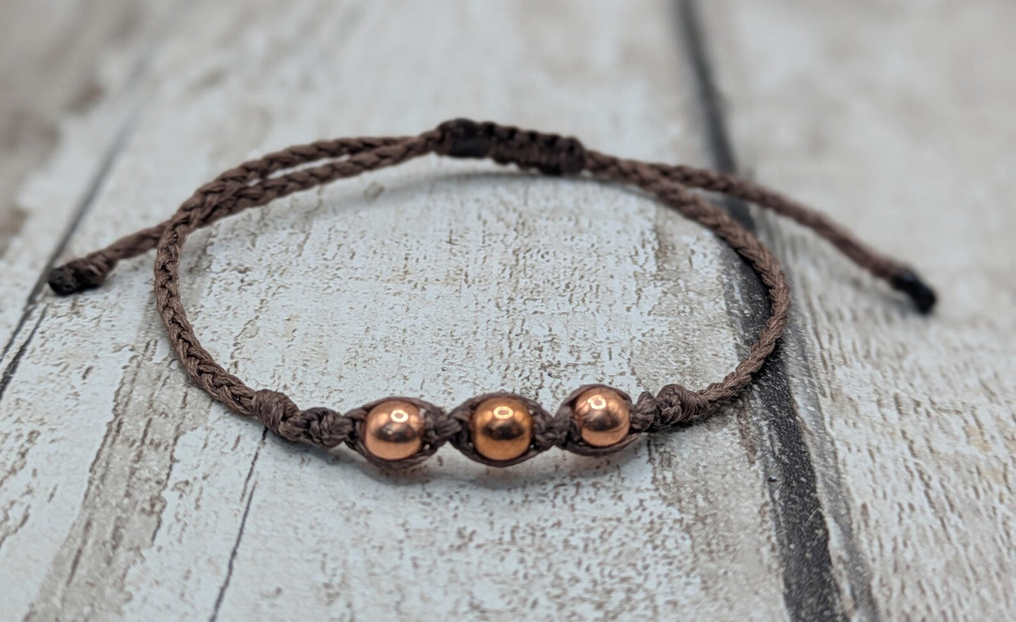 Copper macramé beaded adjustable bracelet.