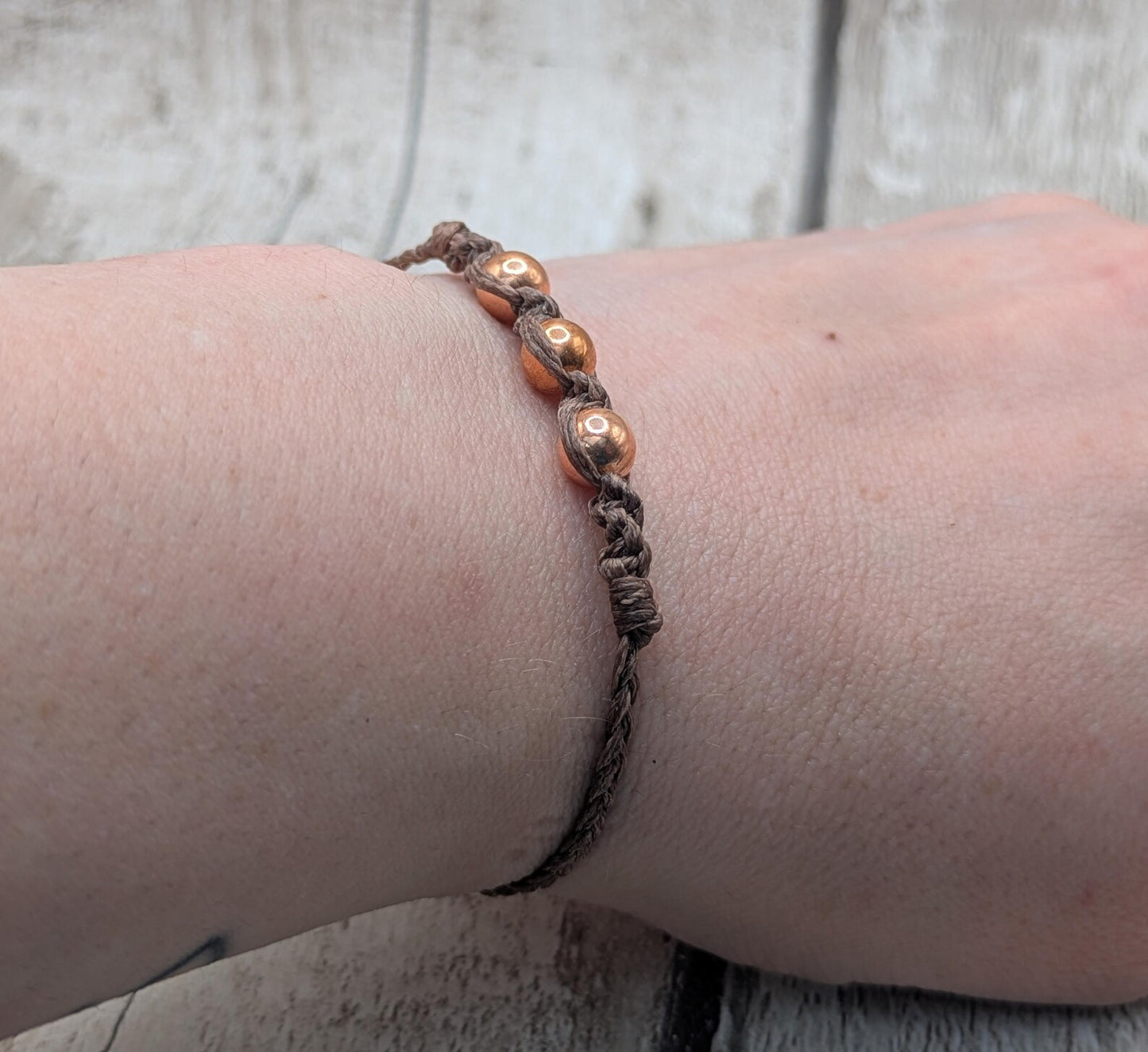 Copper macramé beaded adjustable bracelet.