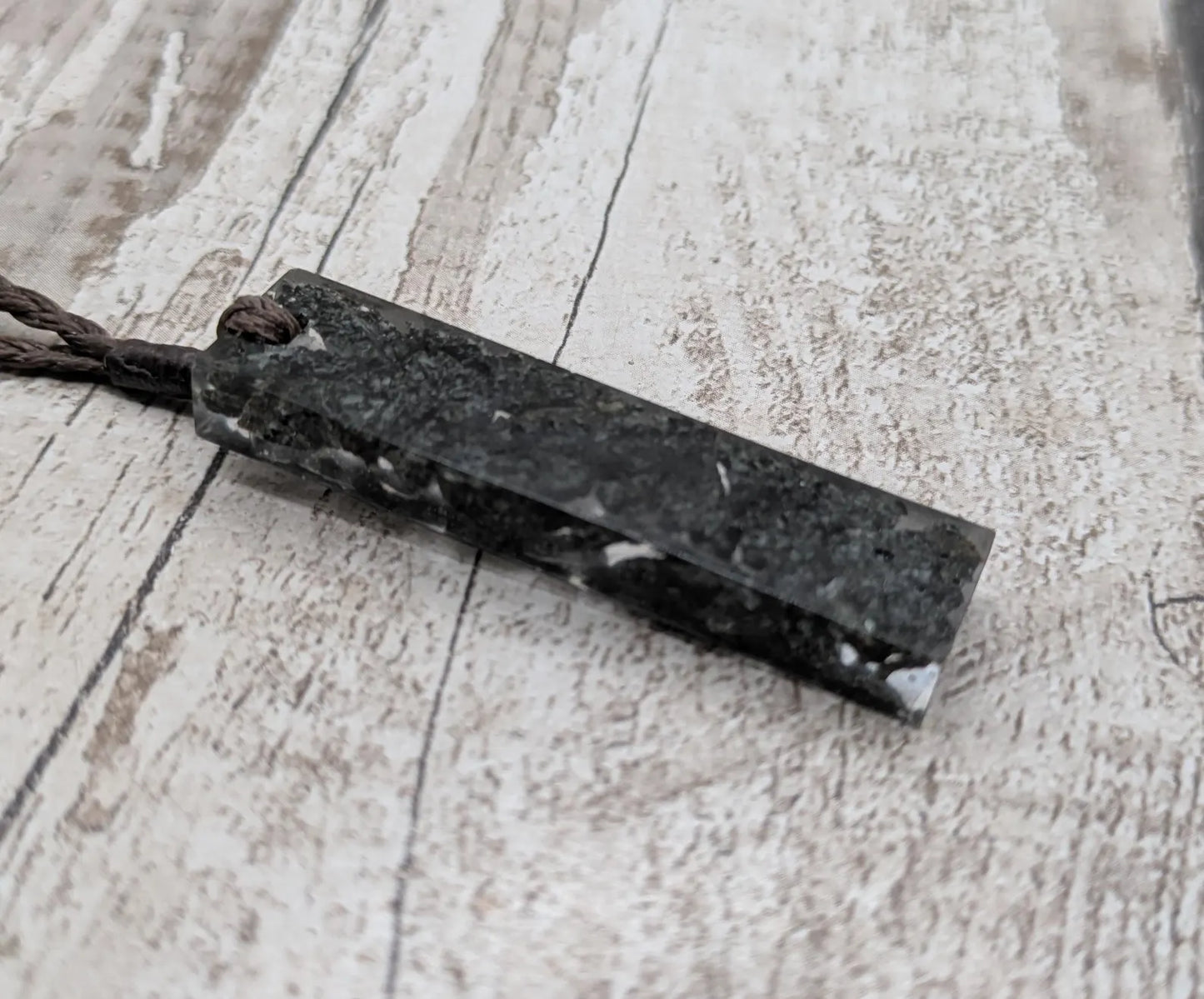 preselli bluestone Stonehenge rock pendant in resin.