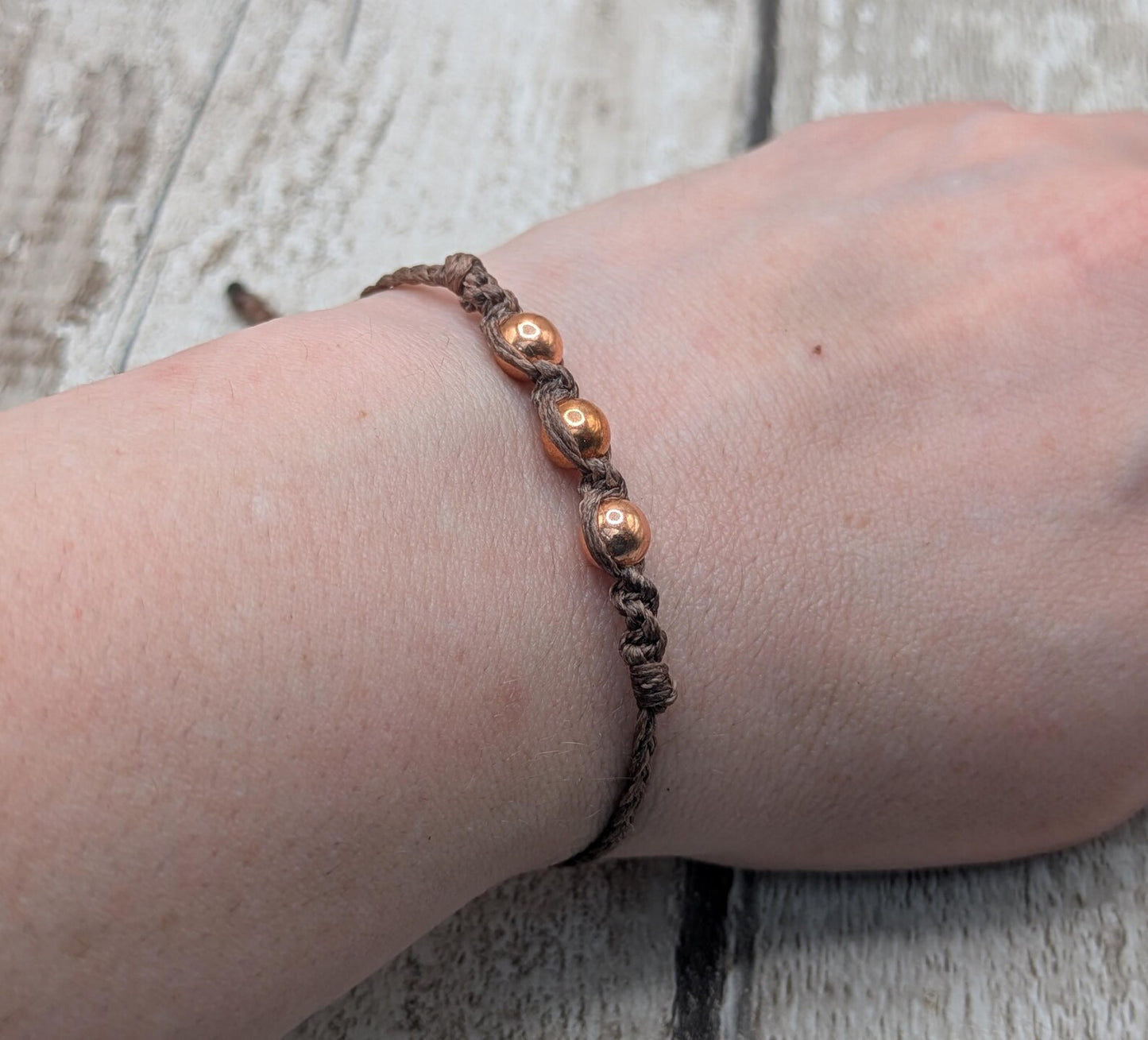Copper macramé beaded adjustable bracelet.