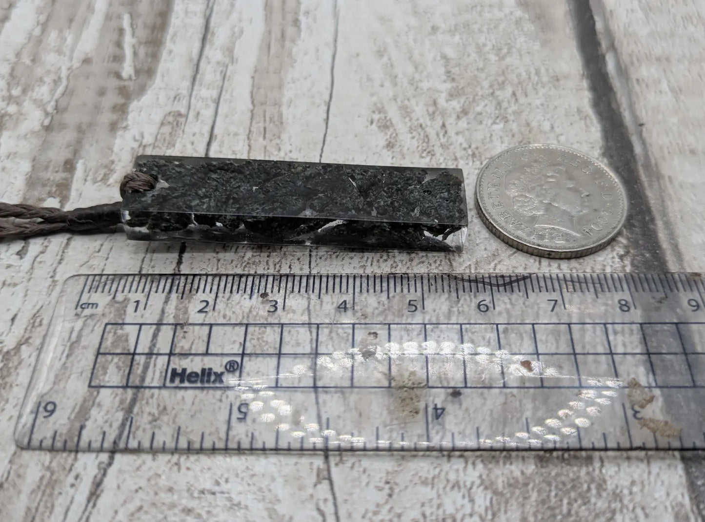 preselli bluestone Stonehenge rock pendant in resin.