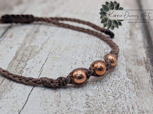 Copper macramé beaded adjustable bracelet.