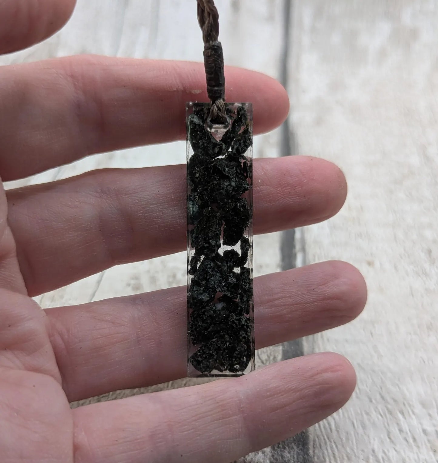 preselli bluestone Stonehenge rock pendant in resin.