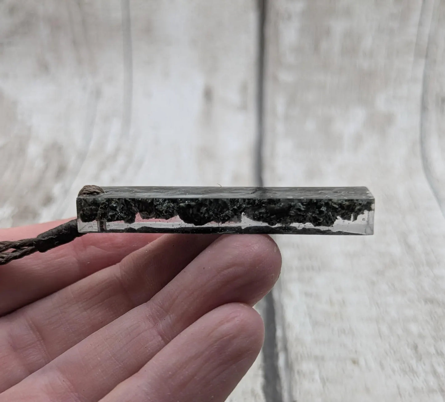 preselli bluestone Stonehenge rock pendant in resin.