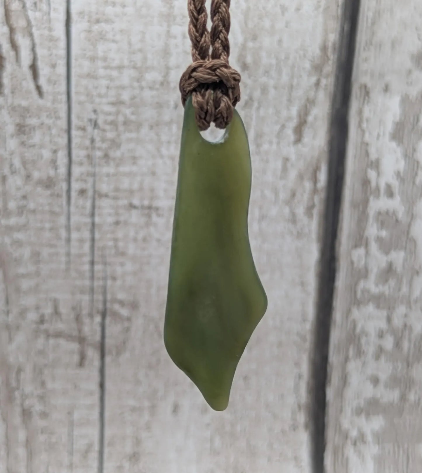 Large tumble Polished new Zealand pounamu greenstone jade pendant.