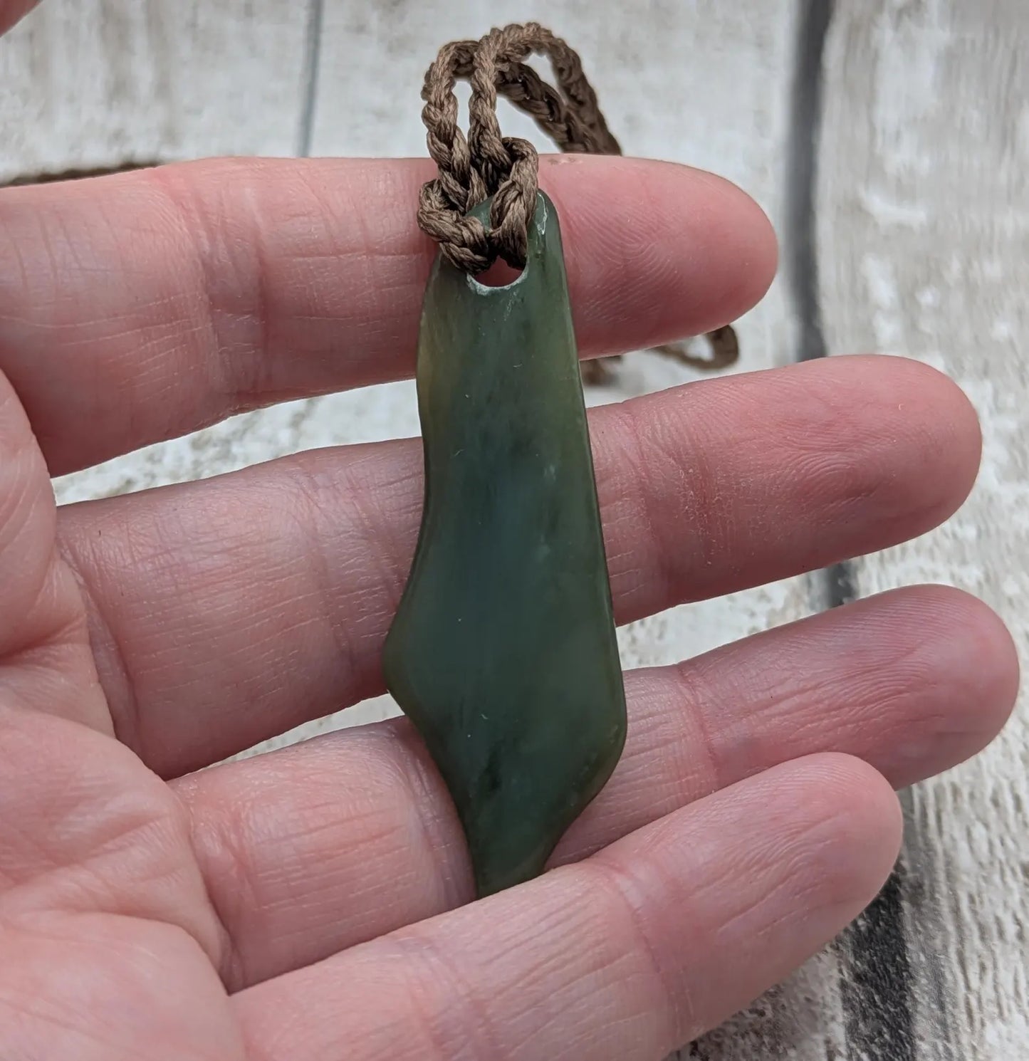 Large tumble Polished new Zealand pounamu greenstone jade pendant.