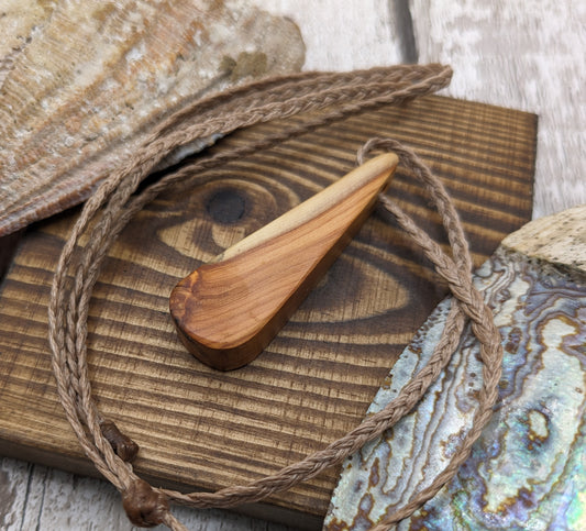 Yew wood roimata teardrop pendant.