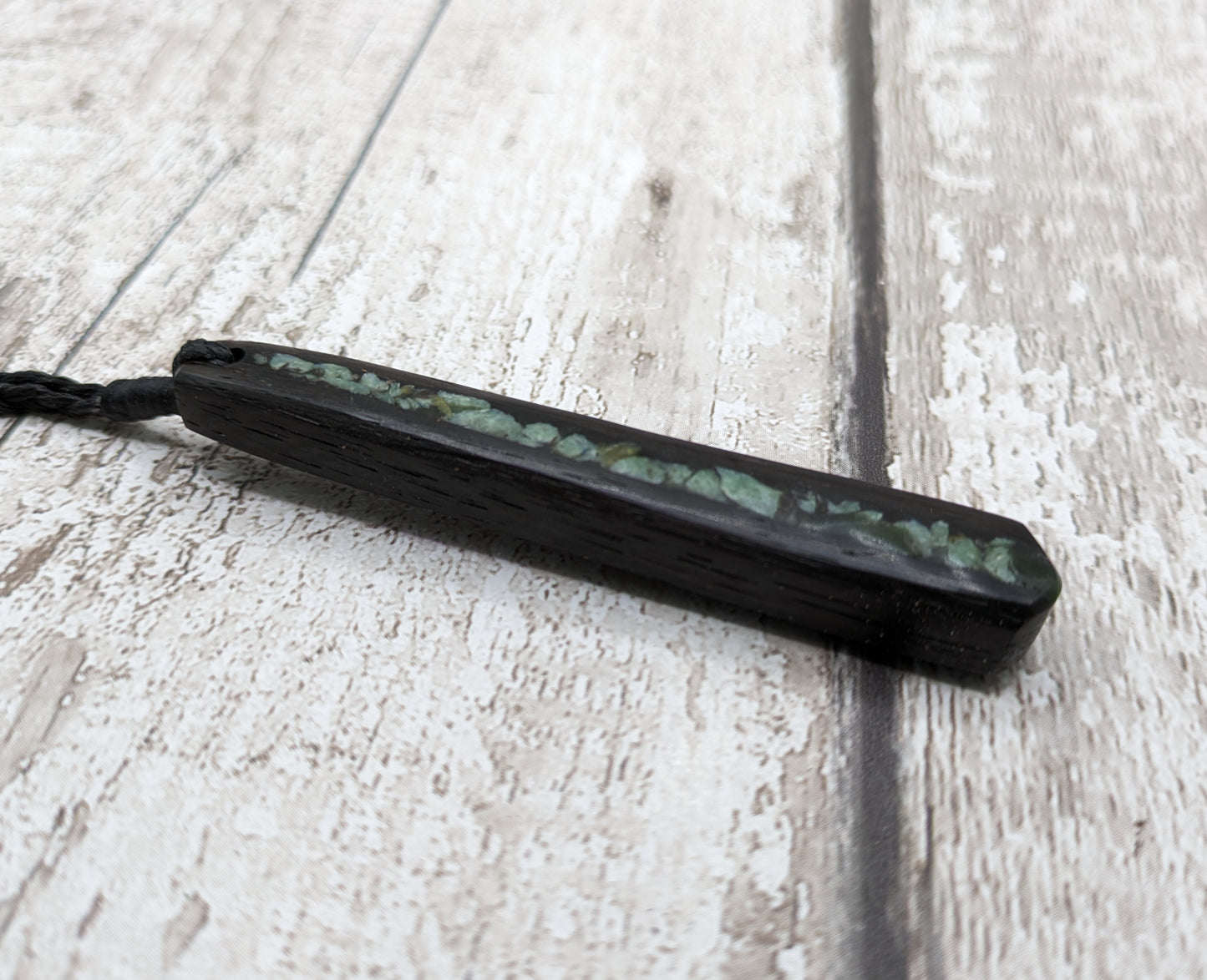 Fenland bog oak roimata pendant with NZ pounamu greenstone.