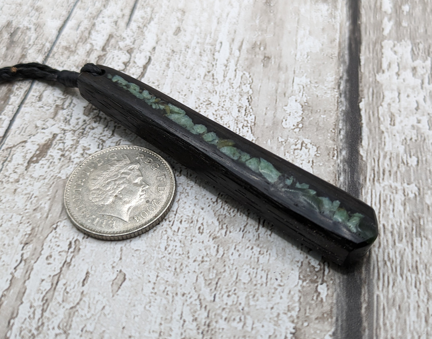 Fenland bog oak roimata pendant with NZ pounamu greenstone.