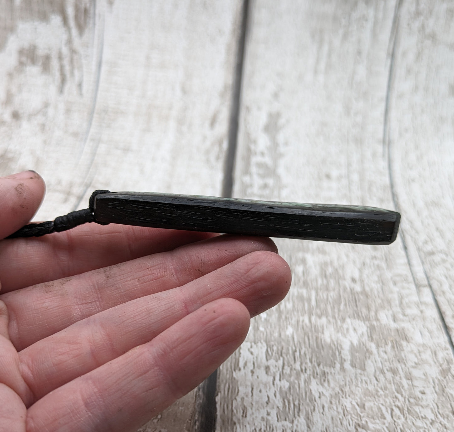 Fenland bog oak roimata pendant with NZ pounamu greenstone.