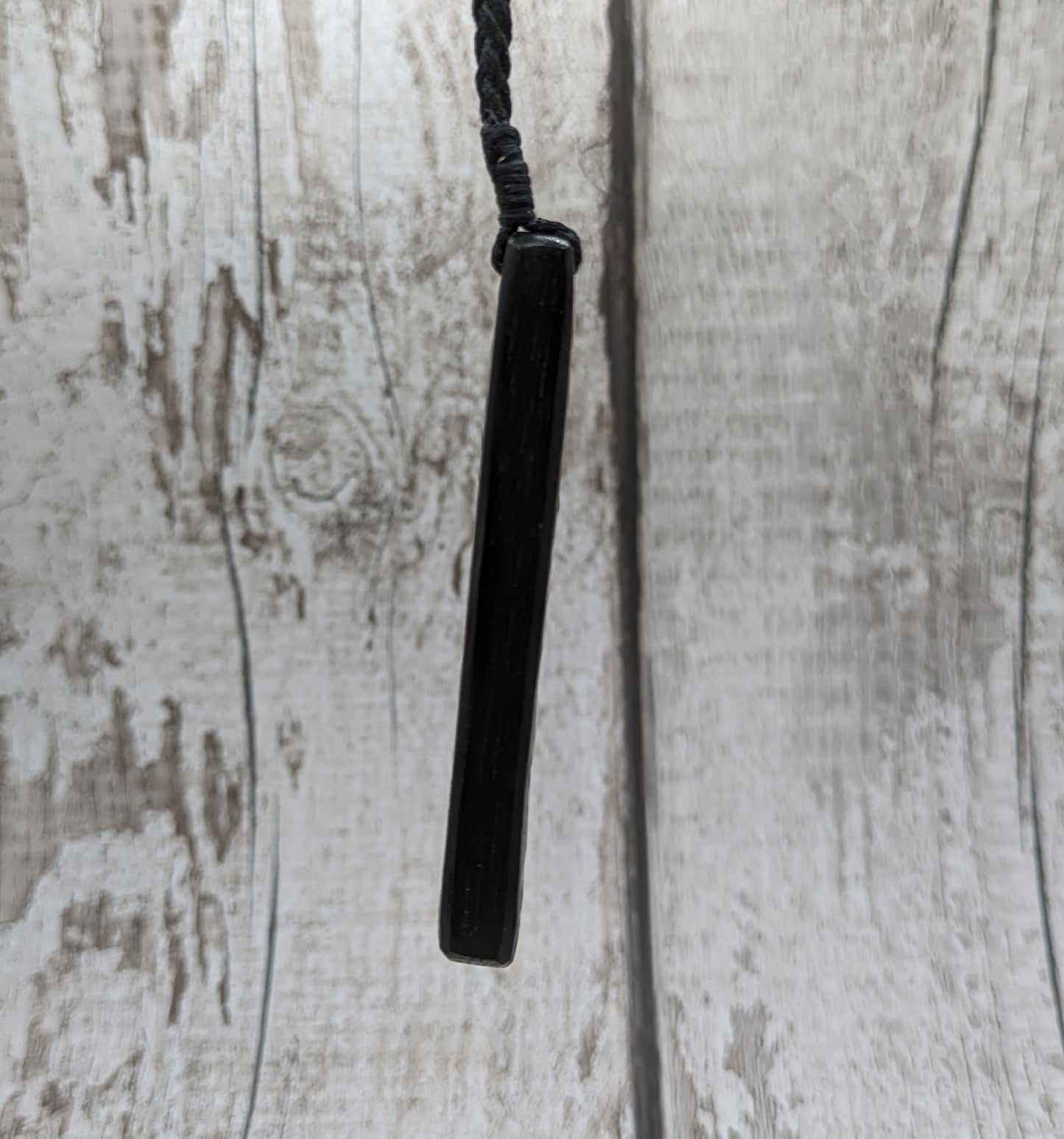 Fenland bog oak roimata pendant with NZ pounamu greenstone.