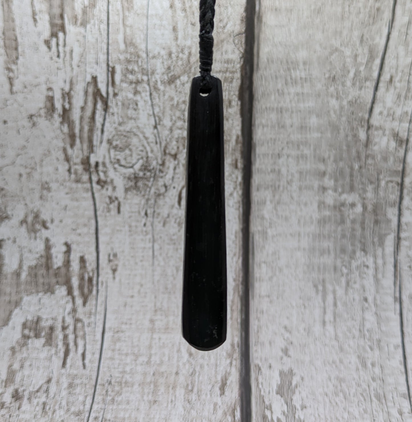 Fenland bog oak roimata pendant with NZ pounamu greenstone.