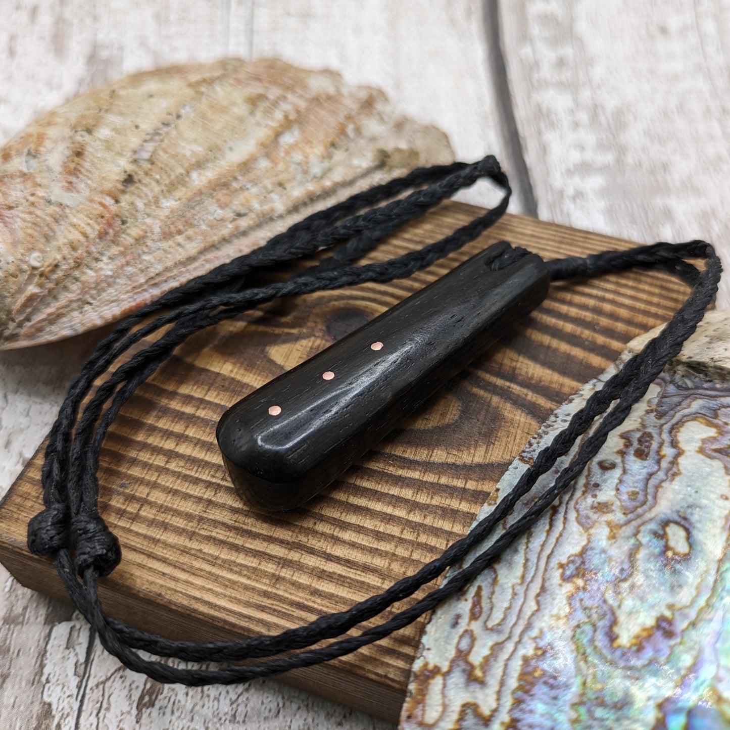 Fenland bog oak with copper pin inlay roimata pendant.