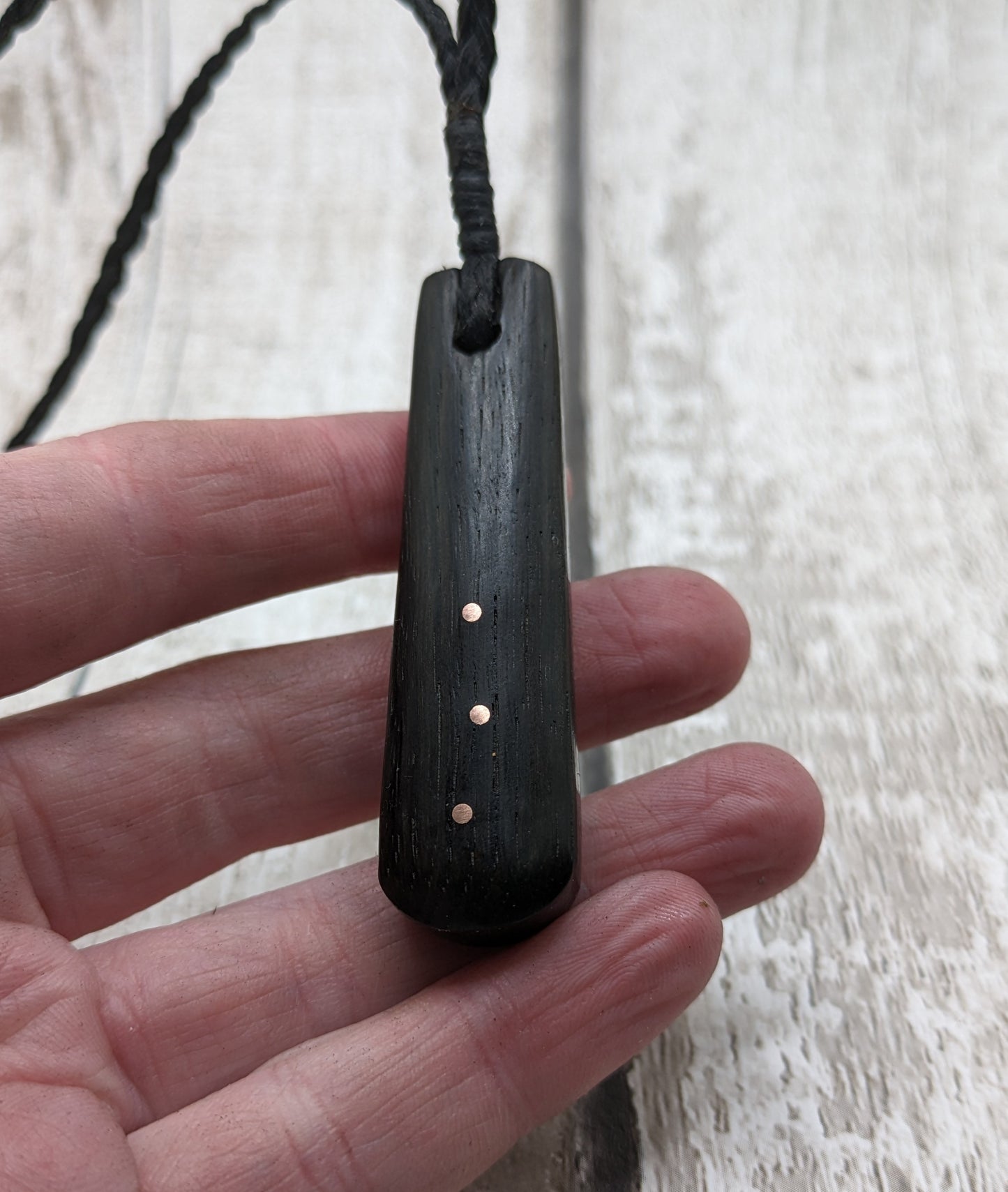 Fenland bog oak with copper pin inlay roimata pendant.