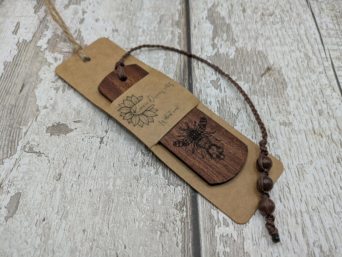 Walnut wood hand made bookmark with laser printed bumble bee design.