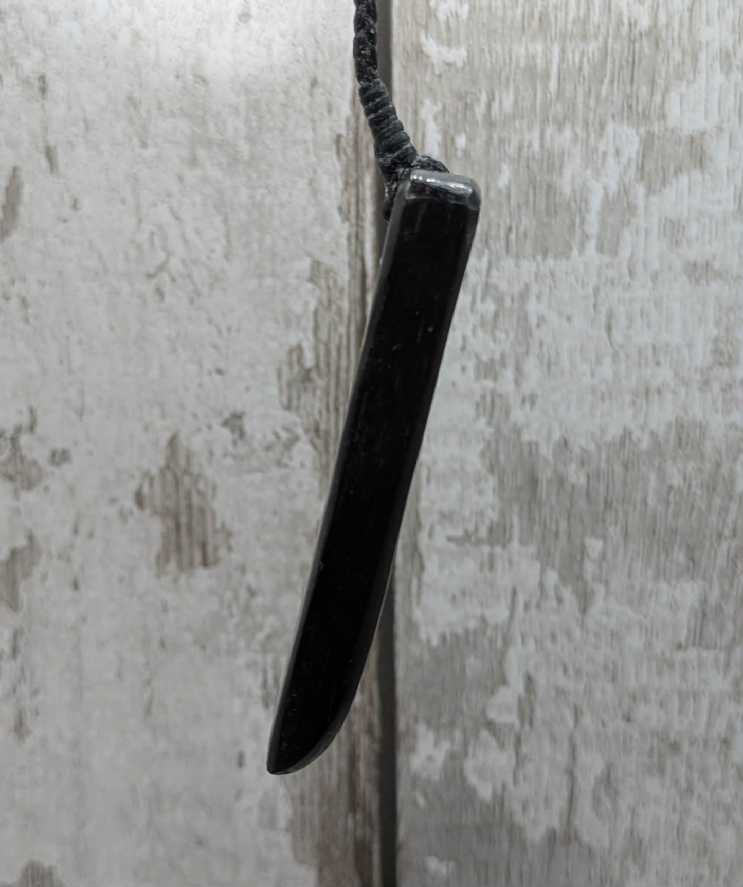 Fenland bog oak and mammoth ivory Toki adze style pendant.