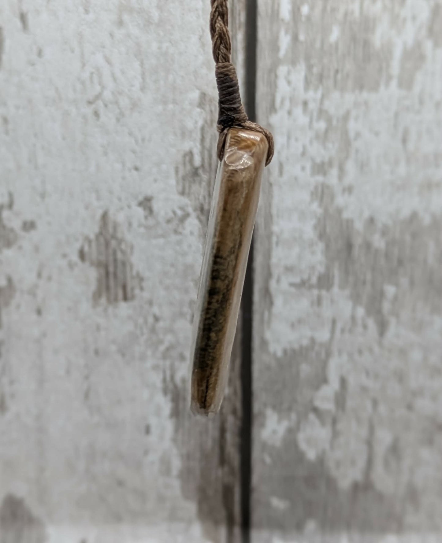 Stable British mammoth ivory trust pendant from Oxfordshire.