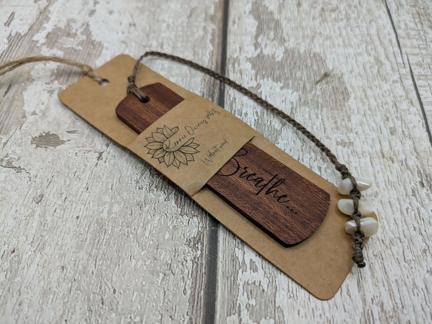 Walnut wood hand made bookmark with breathe laser printed mantra.