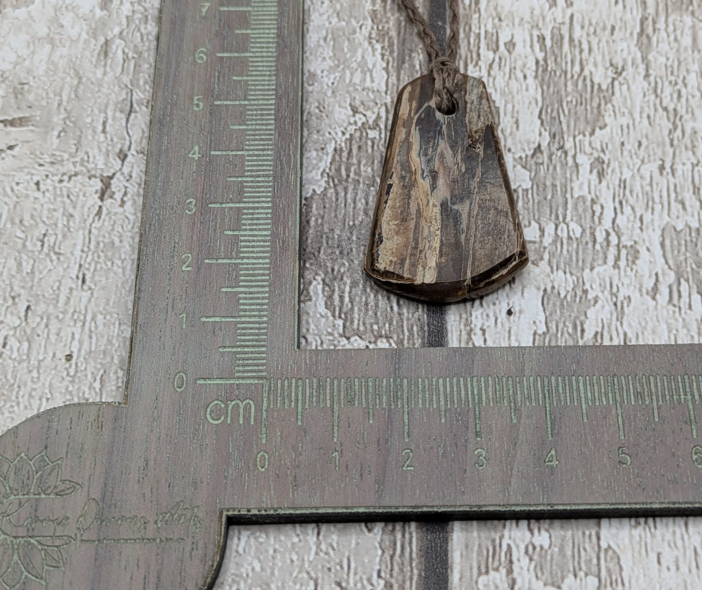 Mammoth ivory tusk fossil roimata teardrop pendant.