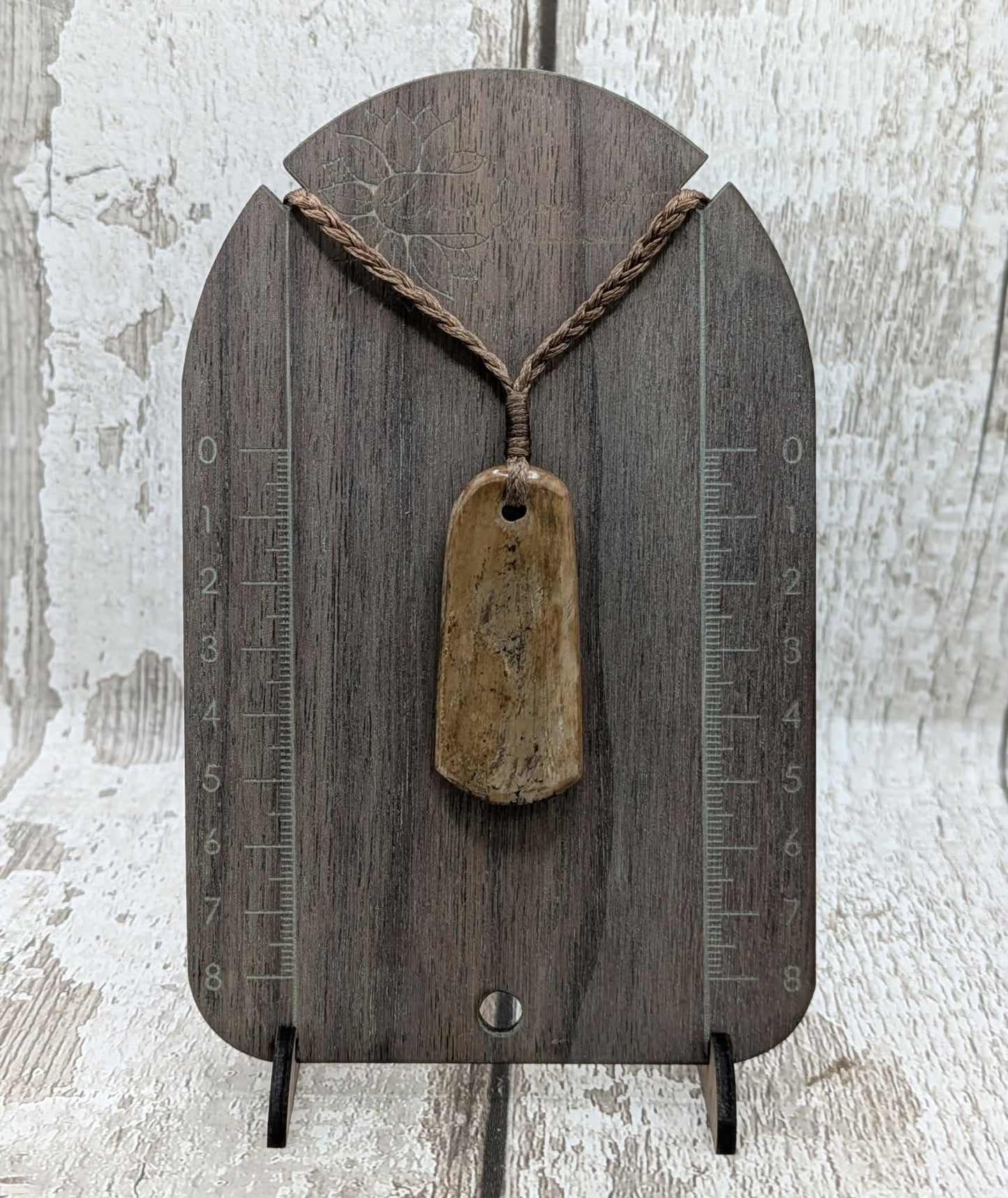 Stable British mammoth ivory trust pendant from Oxfordshire.