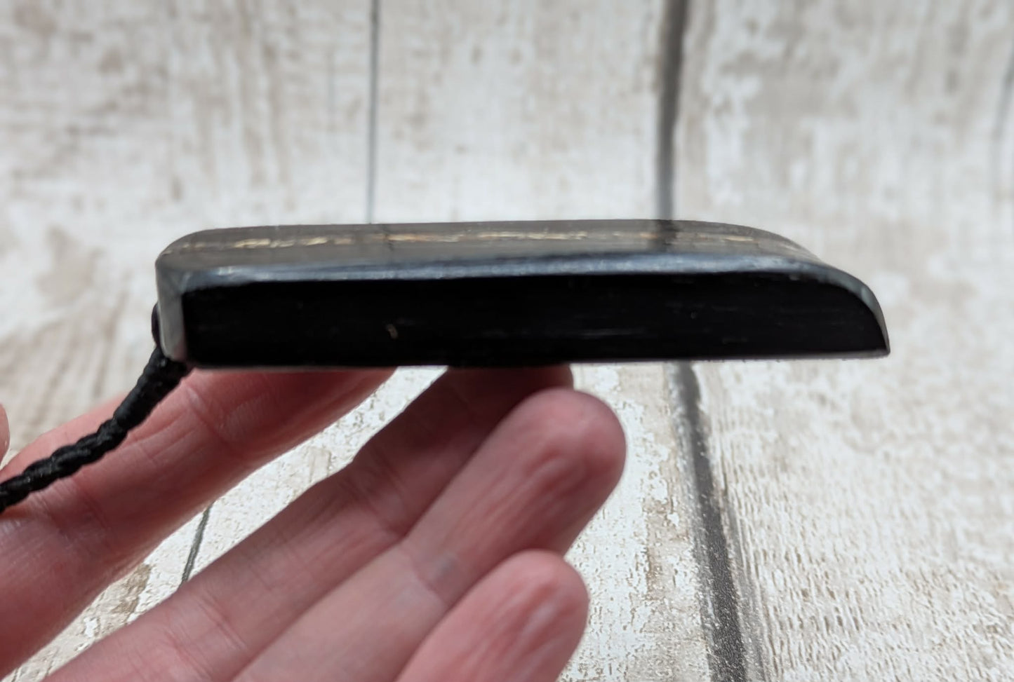 Fenland bog oak and mammoth ivory Toki adze style pendant.