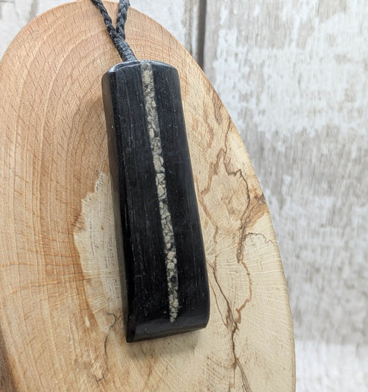 Fenland bog oak pendant with Avebury Sarsen inlay.