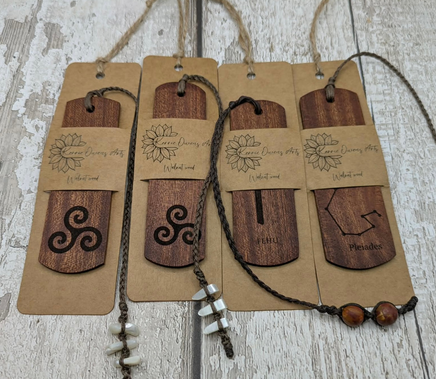 Walnut wood handmade bookmark with fehu Norse rune laser print.