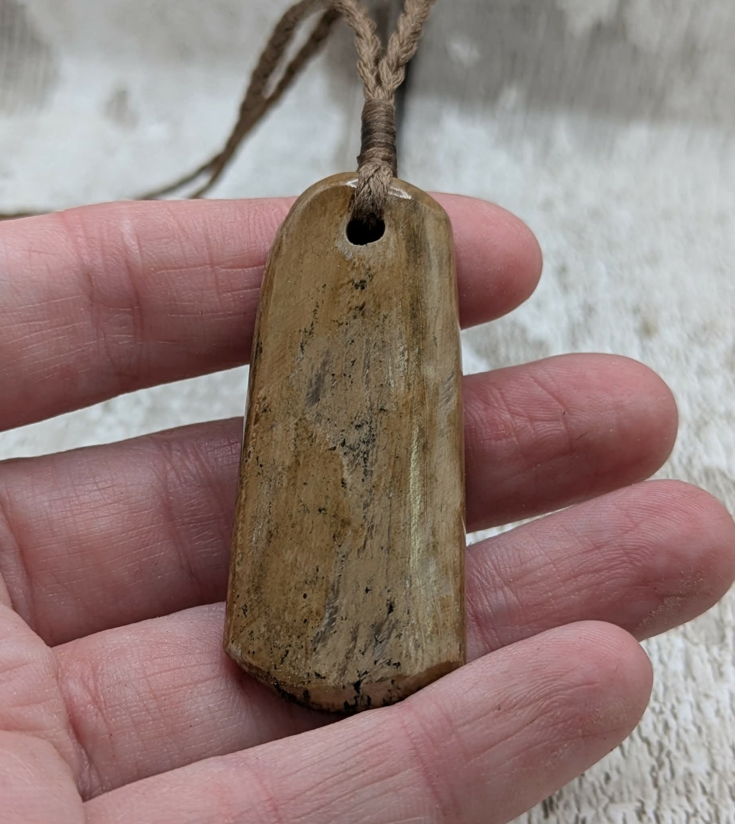 Stable British mammoth ivory trust pendant from Oxfordshire.