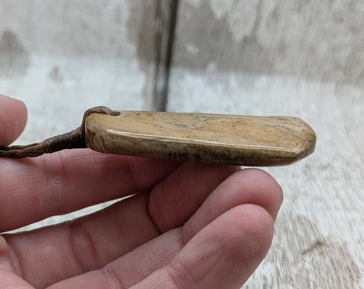 Stable British mammoth ivory trust pendant from Oxfordshire.