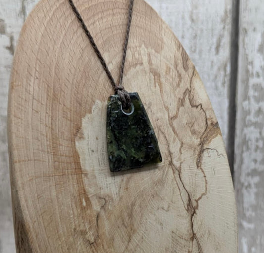 Haast pass serpentine pounamu greenstone Toki style pendant.