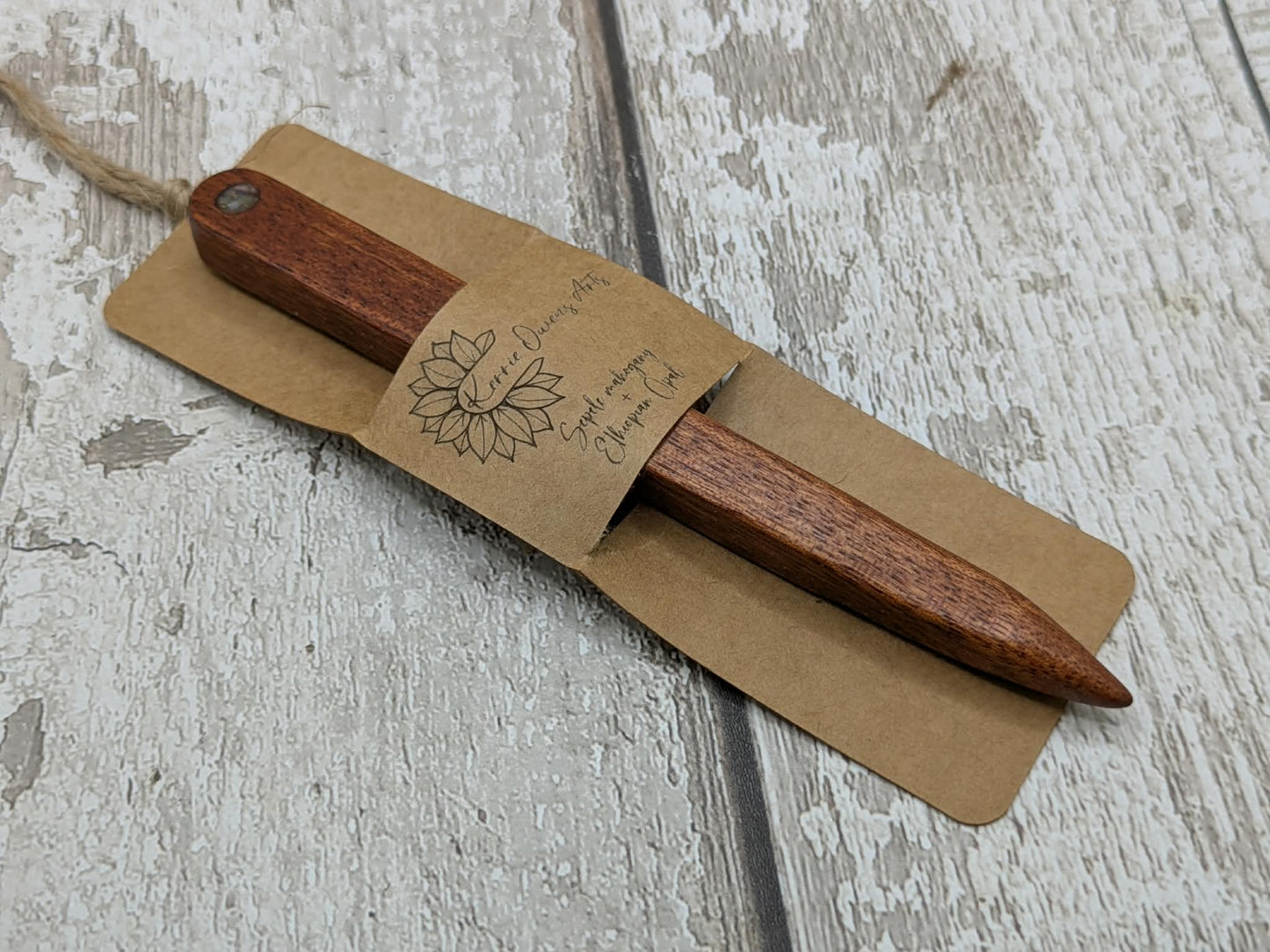 Sepele mahogany wood hair pin with Ethiopian opal inlay.
