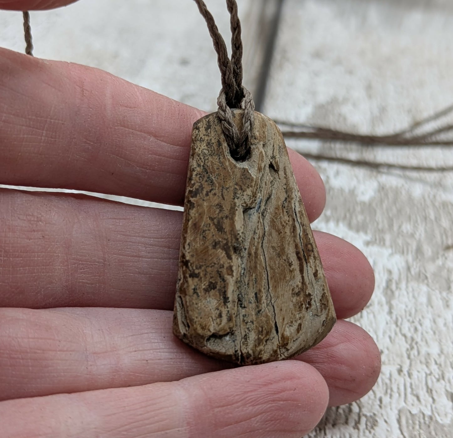 Mammoth ivory tusk fossil roimata teardrop pendant.