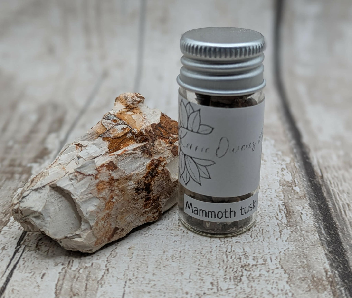 Mammoth ivory vial for jewellery inlay or spell ingredients.