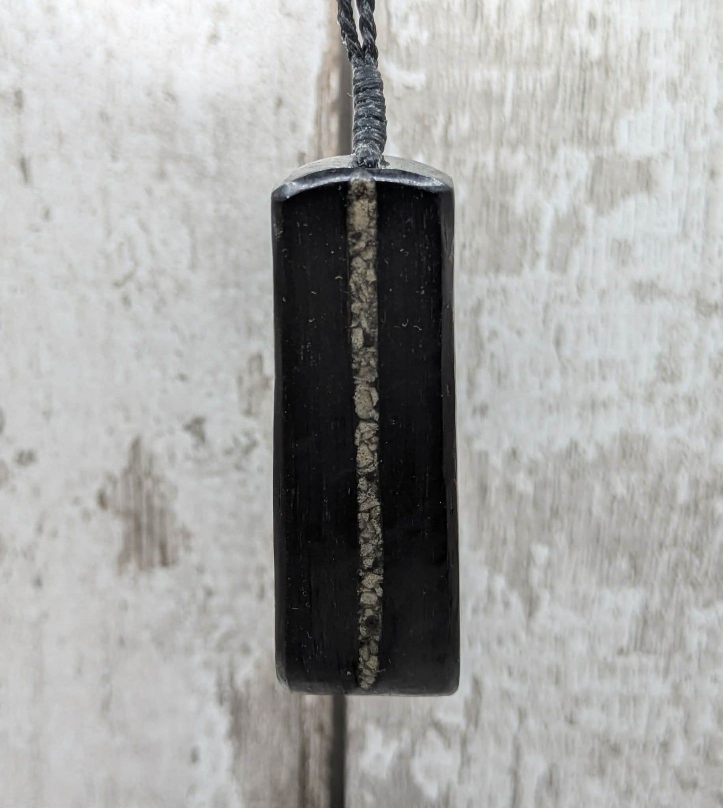Fenland bog oak and mammoth ivory Toki adze style pendant.