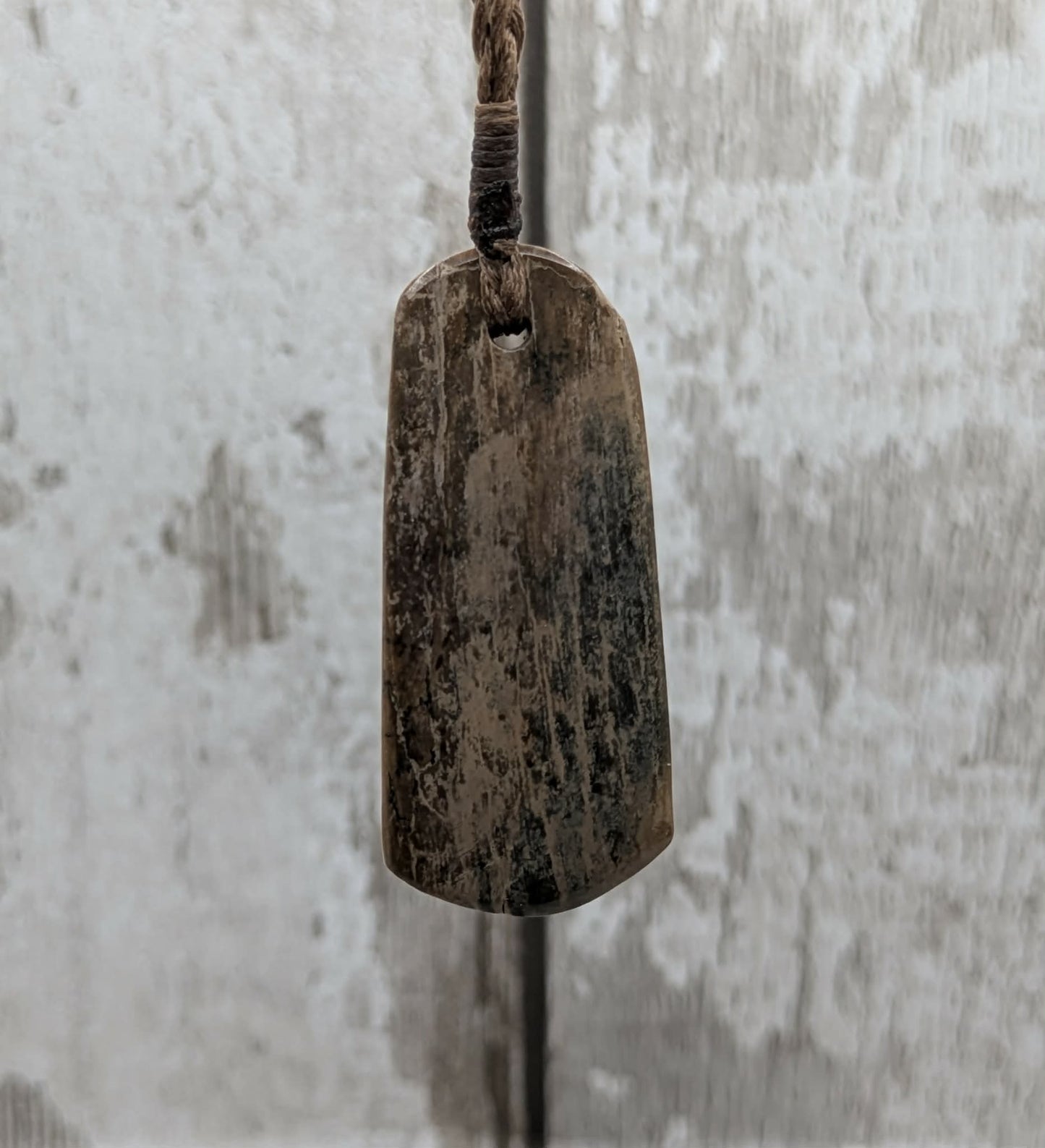 Stable British mammoth ivory trust pendant from Oxfordshire.