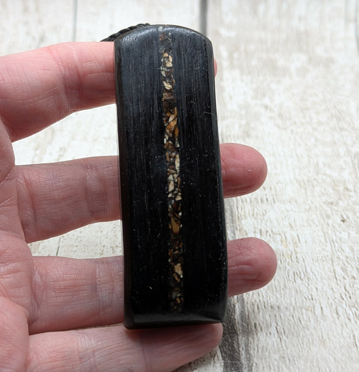 Fenland bog oak and mammoth ivory Toki adze style pendant.