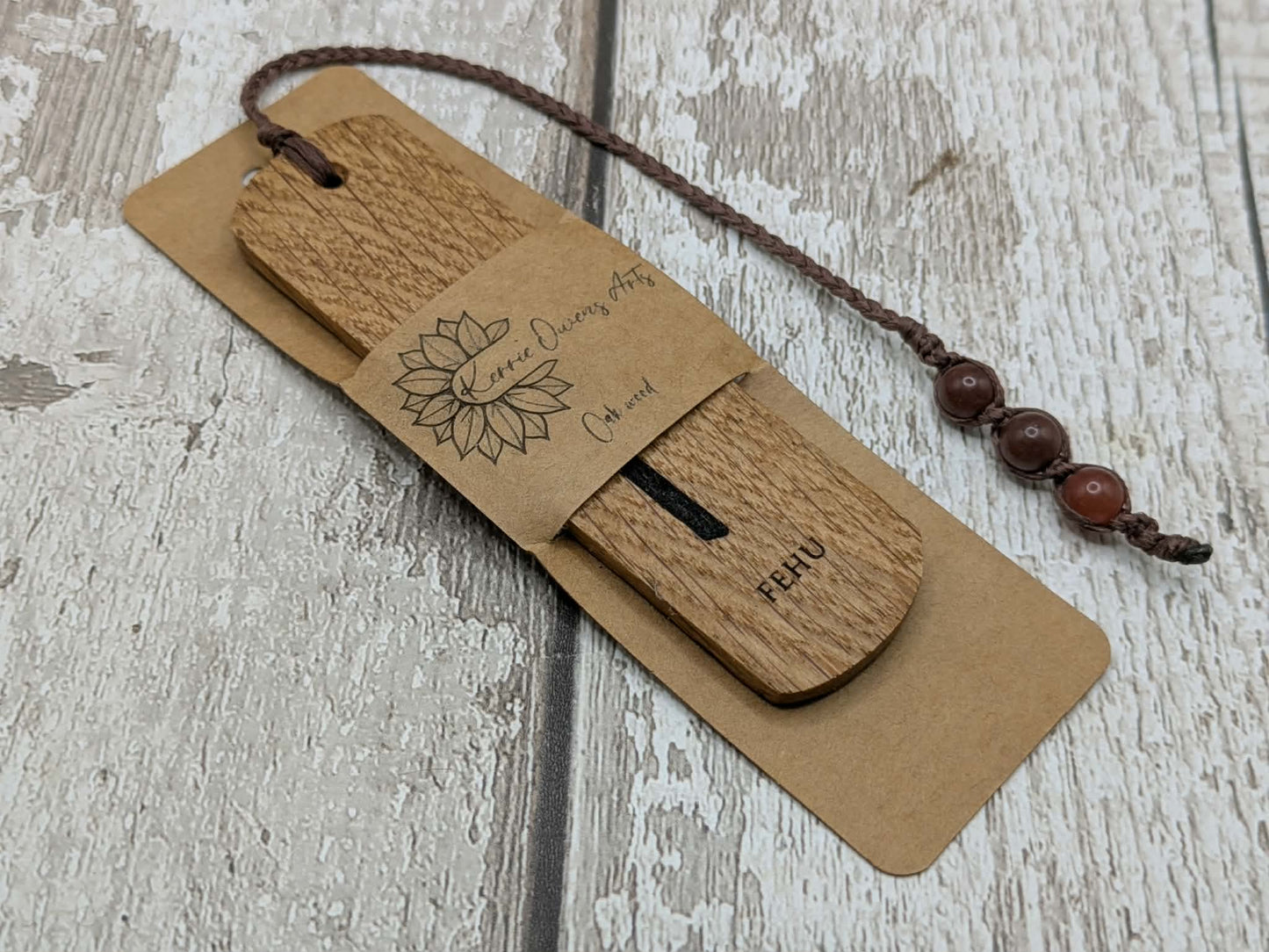 Handmade oak wood fehu rune bookmark.