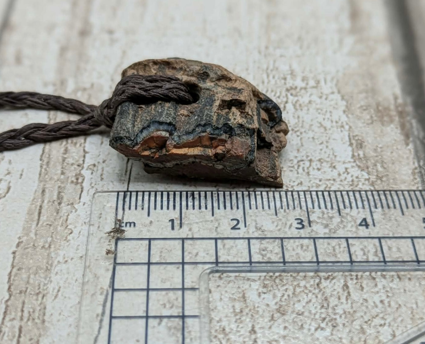 Mammoth tooth chunk pendant.