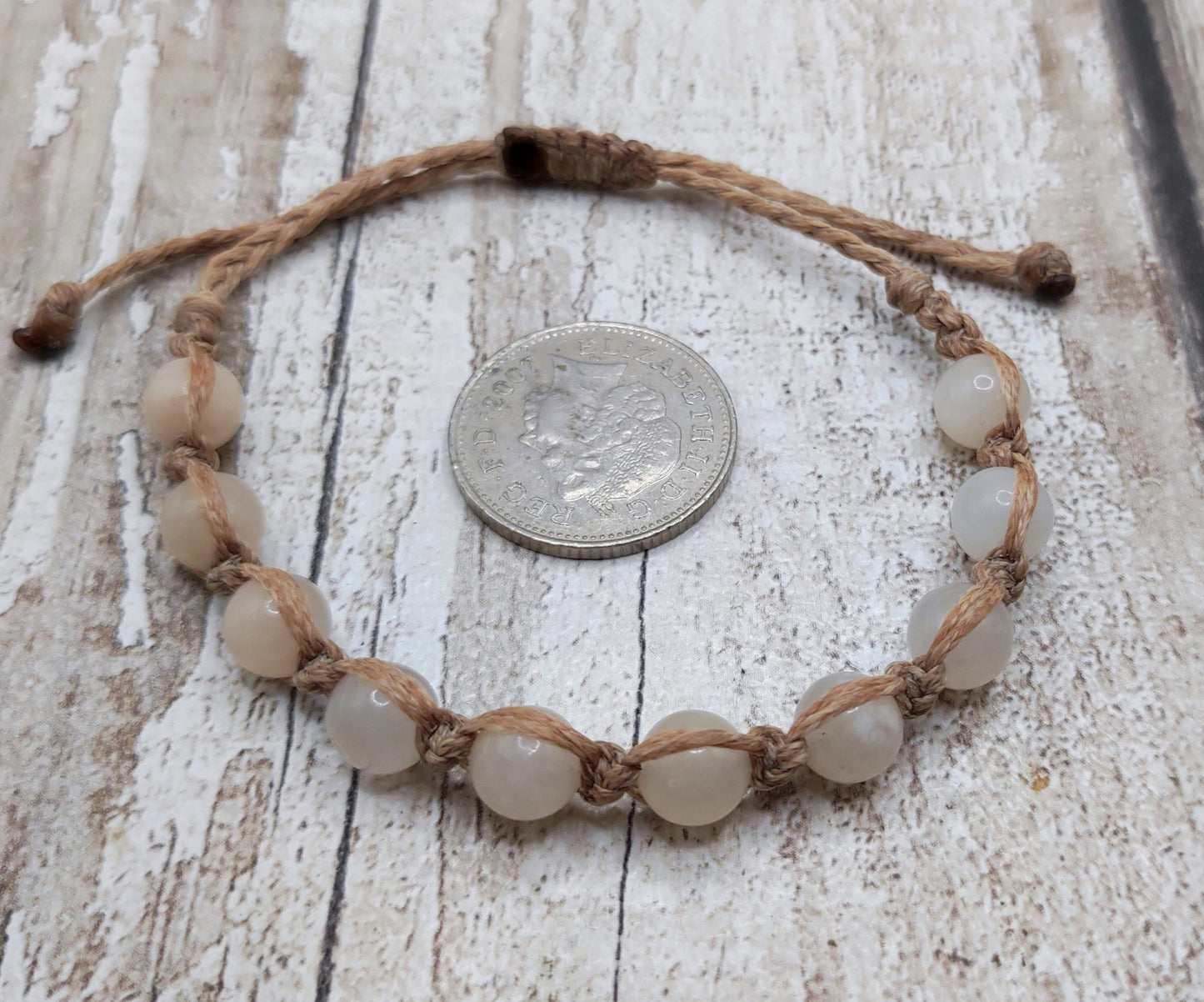 Peach adventurine 8mm bead adjustable macramé bracelet.