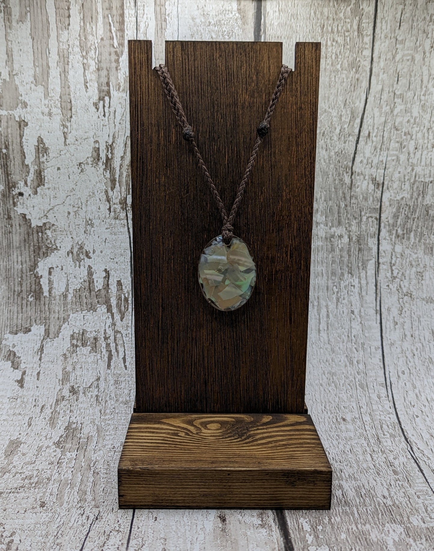 Oyster shell in UV resin pendant.