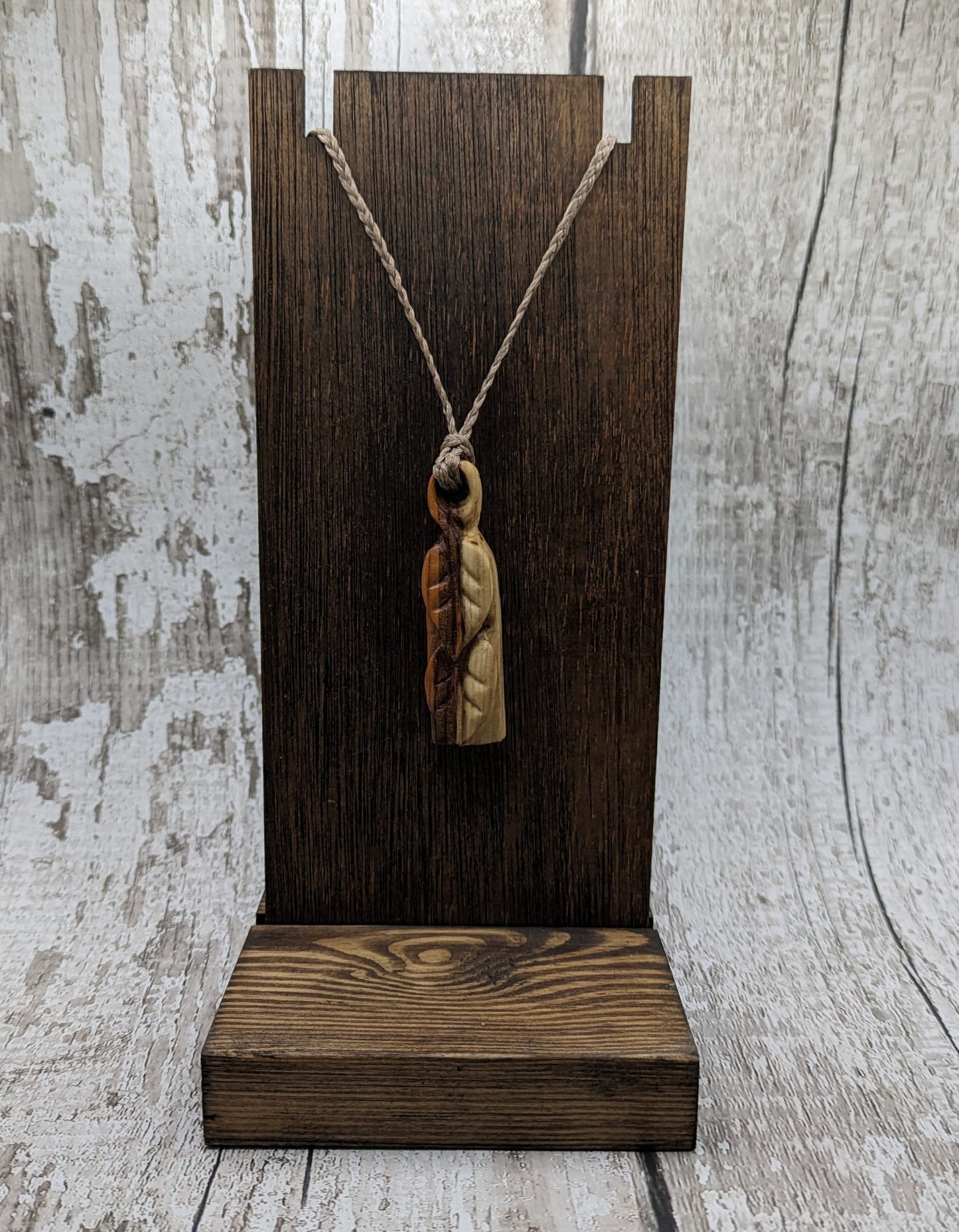 yew wood woodland leaves carved pendant.