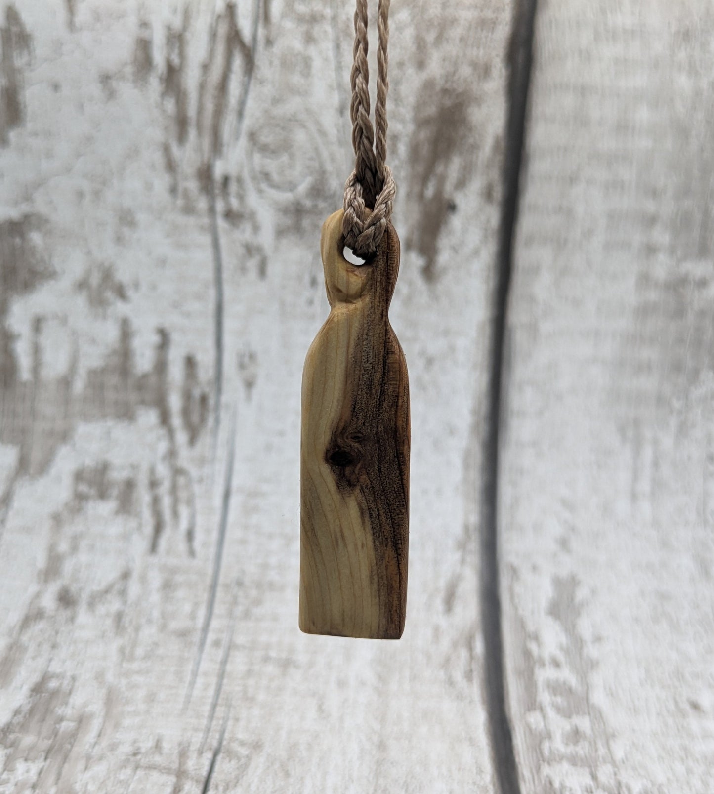 yew wood woodland leaves carved pendant.