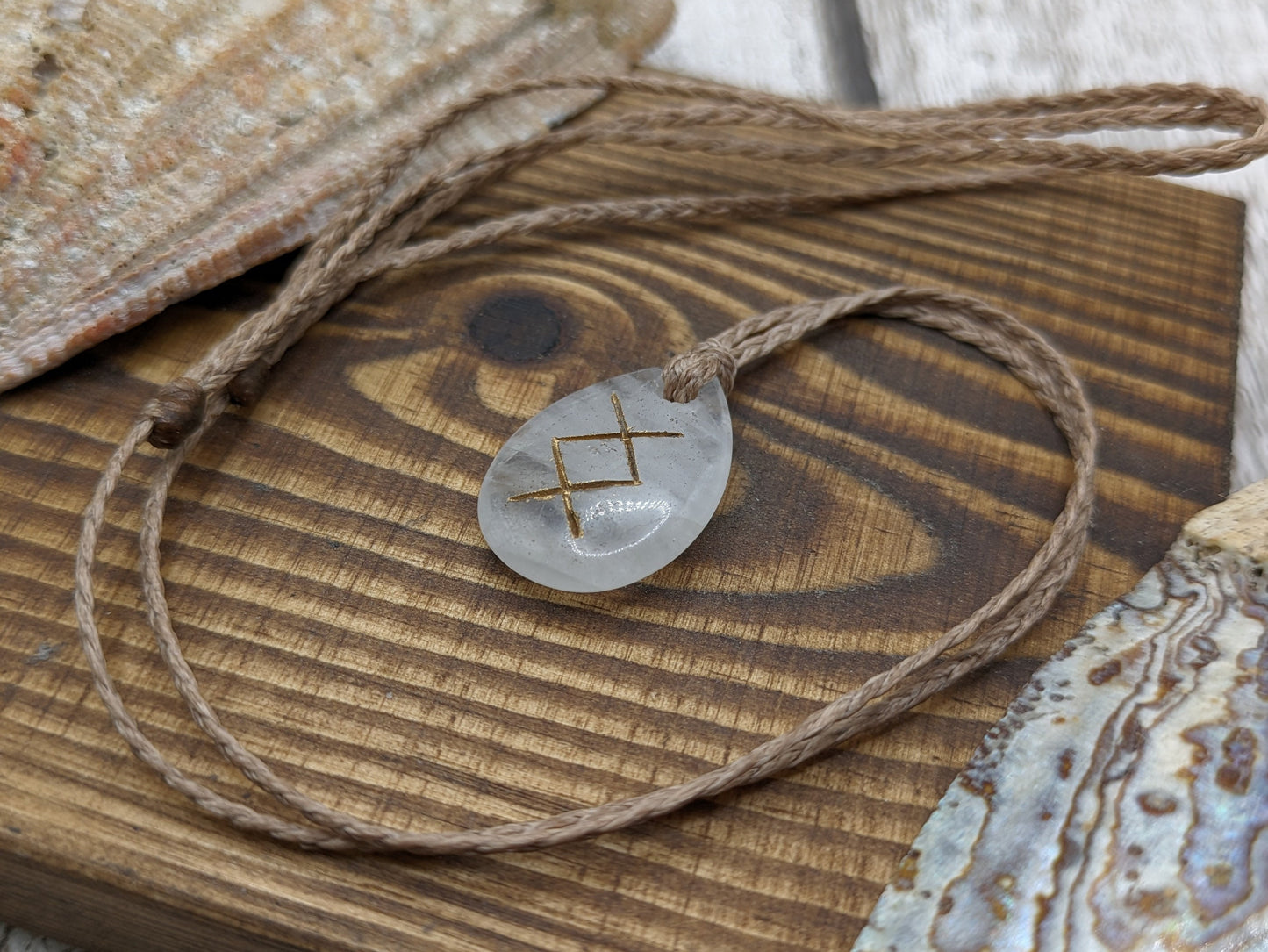 Ingwaz palm stone rune pendant.